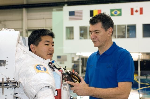 NASA image: STS-120 crew during NBL training with Dan Tani