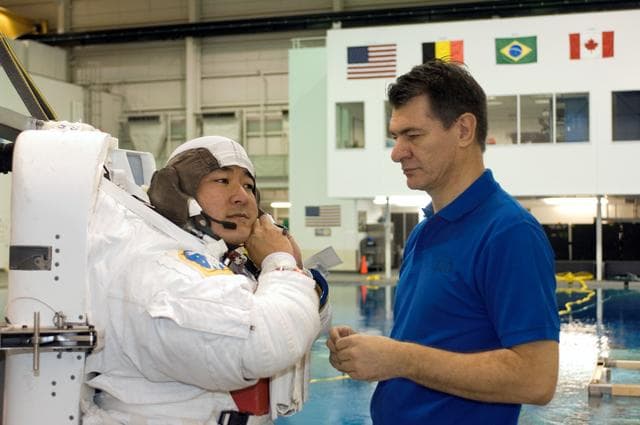 NASA image: STS-120 crew during NBL training with Dan Tani