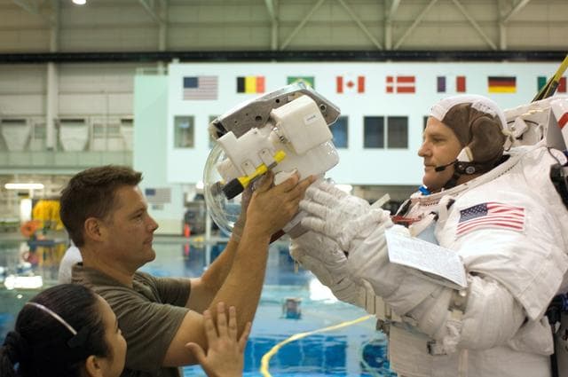 NASA image: STS-120 crew during NBL training with Dan Tani