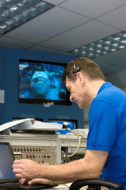 NASA image: STS-120 crew during NBL training with Dan Tani
