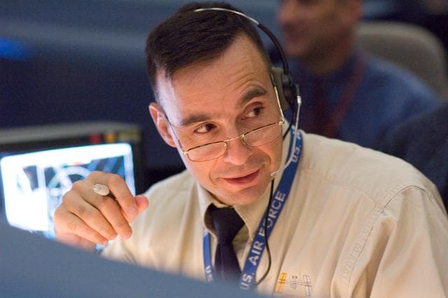 NASA image: STS-120 Flight Controllers on console during mission (Launch) - (Bldg. 30s, WFCR)