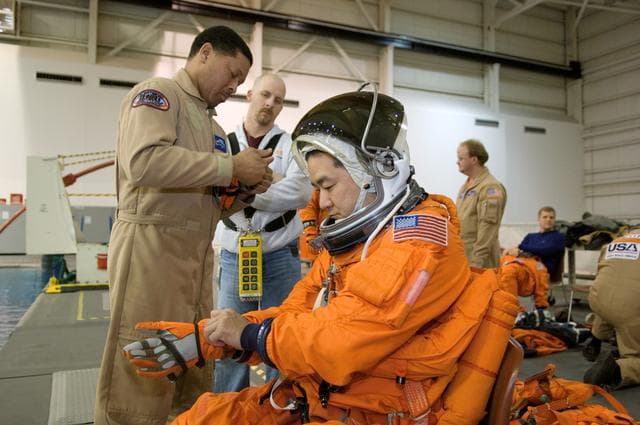 NASA image: STS-120 water survival training at the NBL