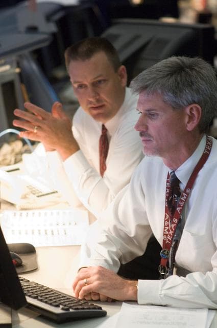 NASA image: STS-120 Flight Controllers on console during mission