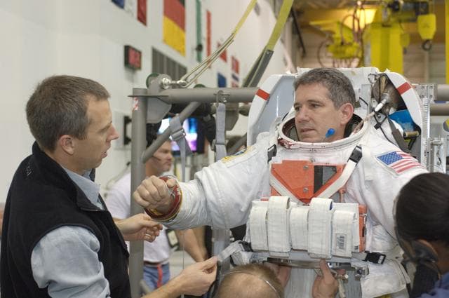 NASA image: STS-125 Crewmembers preparing for NBL dive
