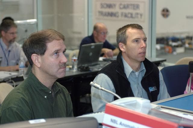 NASA image: STS-125 Crewmembers preparing for NBL dive