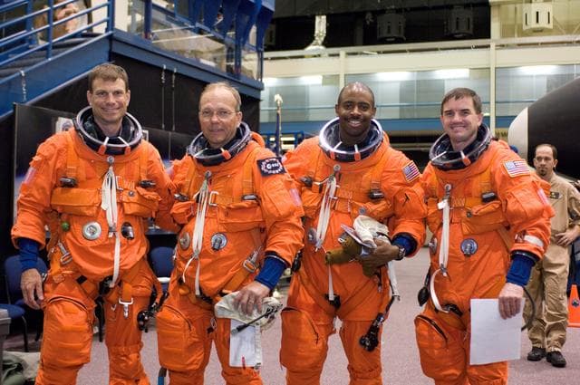 NASA image: STS-122 Crew Members during Post Insertion / Deorbit Prepreparation in Building 9 NW
