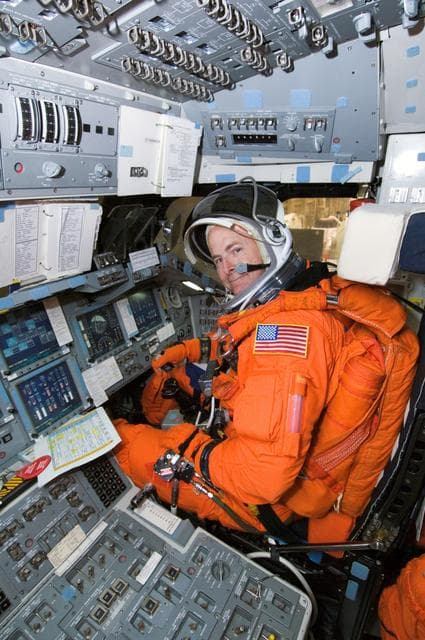NASA image: STS-122 Crew Members during Post Insertion / Deorbit Prepreparation in Building 9 NW