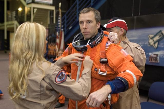 NASA image: STS-125 Crew during Post Insertion/Deorbit Prep training in CCT II mockup.
