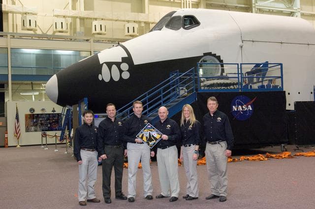 NASA image: STS-124 during crew/training team photos, suit up and ASC/CAP/DES training