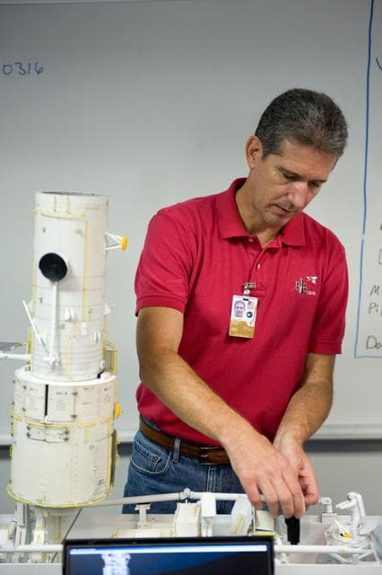 NASA image: STS-125 crew training. Astronauts Grunsfeld and Feustel