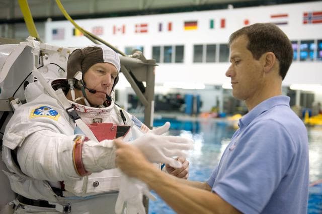 NASA image: STS-127 astronauts Dave Wolf and Tim Kopra during STS-127 2J/A EVA training at the NBL