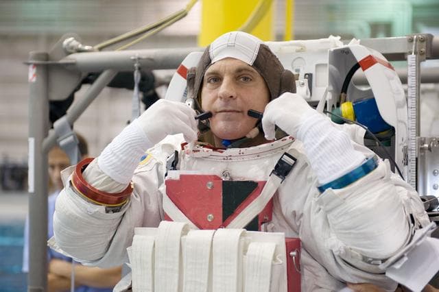 NASA image: STS-127 astronauts Dave Wolf and Tim Kopra during STS-127 2J/A EVA training at the NBL