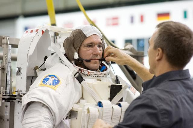 NASA image: HUBBLE crew members Michael J. Massimino and Michael T. Good