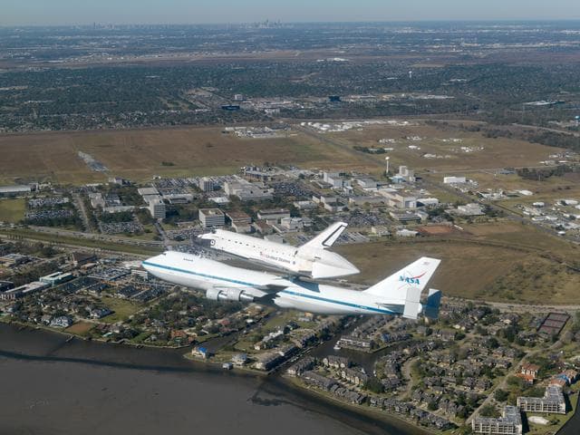 NASA image: Space Shuttle Endeavour flies by Johnson Space Center