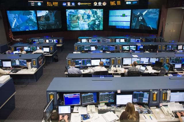 NASA image: STS-119 Flight Controllers on Console (Orbit Shift 1)