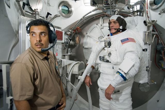 NASA image: SSATA Crew Training and EMU Verification for STS-128 crew member Danny Olivas during suited dry run. 