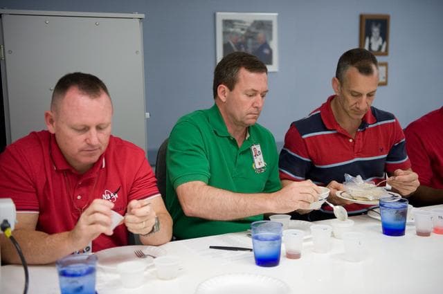 NASA image: STS-129 food tasting  session.