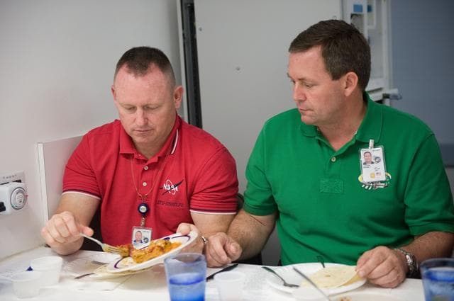 NASA image: STS-129 food tasting  session.