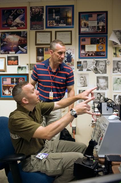 NASA image: STS-129 crew training in the JSC VR lab during SSRMS refresher training. 
