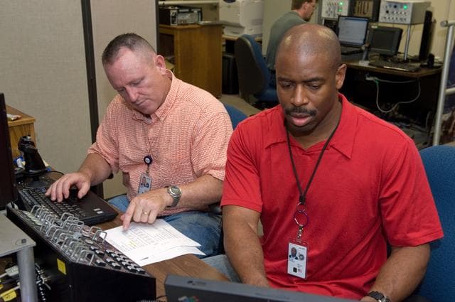 NASA image: STS-129 crew training in the JSC VR lab during SSRMS refresher training. 