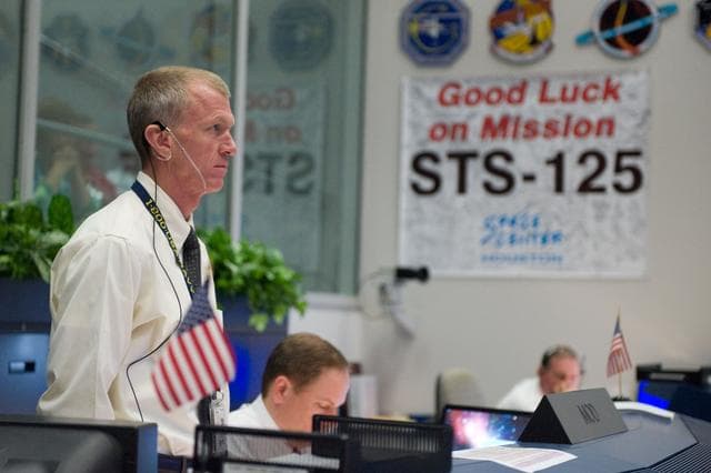 NASA image: STS-125 Flight Controllers on Console - (Orbit Shift)