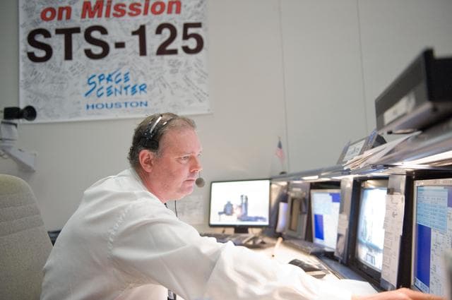 NASA image: STS-125 Flight Controllers on Console - (Orbit Shift)
