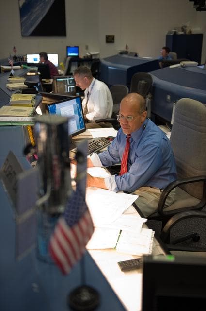 NASA image: STS-125 Flight Controllers on Console During HST Grapple - Orbit 1. Flight Director: Tony Ceccacci 