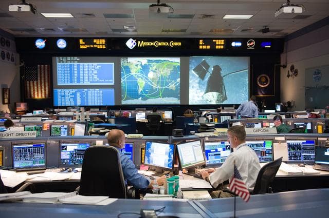 NASA image: STS-125 Flight Controllers on Console During HST Grapple - Orbit 1. Flight Director: Tony Ceccacci 