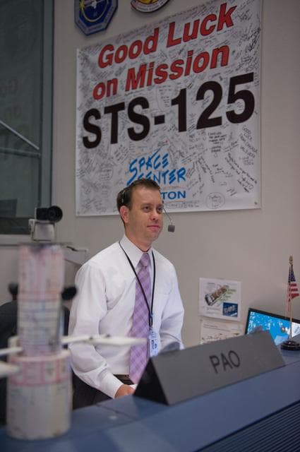 NASA image: STS-125 Orbit 3/Planning flight controllers with Flight Director Paul Dye. 