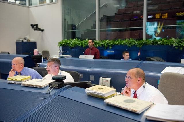 NASA image: STS-125 Flight Controllers on Console - (Orbit Shift 1). Flight Director: Anthony Ceccacci 