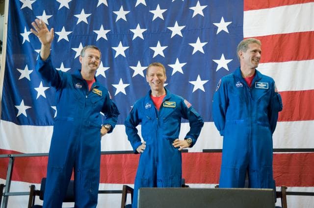 NASA image: STS-125 Crew Return Ceremony and autograph session at Ellington Field. 