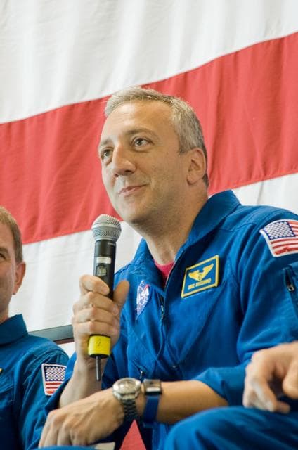 NASA image: STS-125 Crew Return Ceremony and autograph session at Ellington Field. 