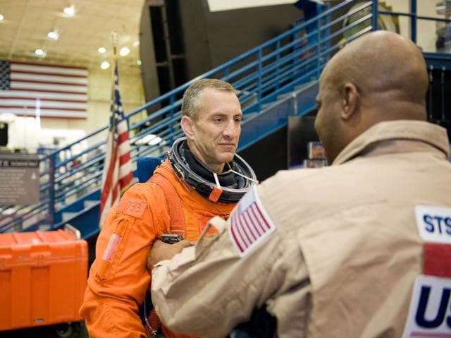 NASA image: STS-129 Preflight Training. Suited payload egress training.