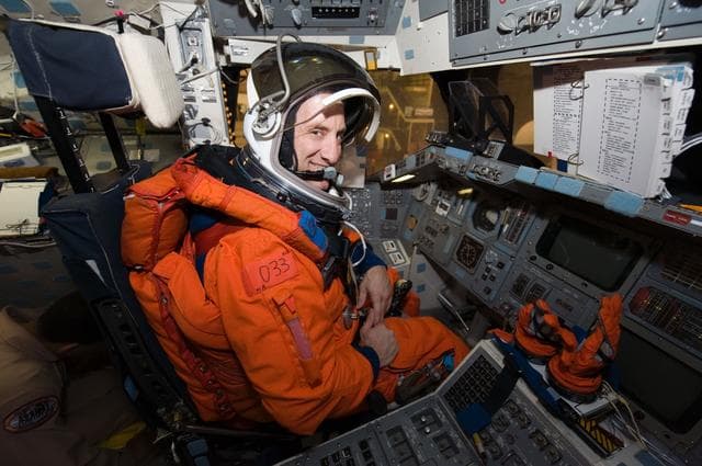 NASA image: STS-129 Preflight Training. Suited payload egress training.
