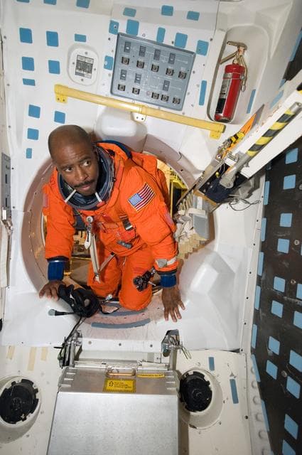 NASA image: STS-129 Preflight Training. Suited payload egress training.
