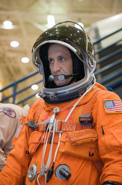 NASA image: STS-129 Preflight Training. Suited payload egress training.