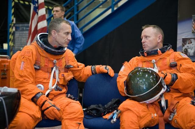 NASA image: STS-129 Preflight Training. Suited payload egress training.