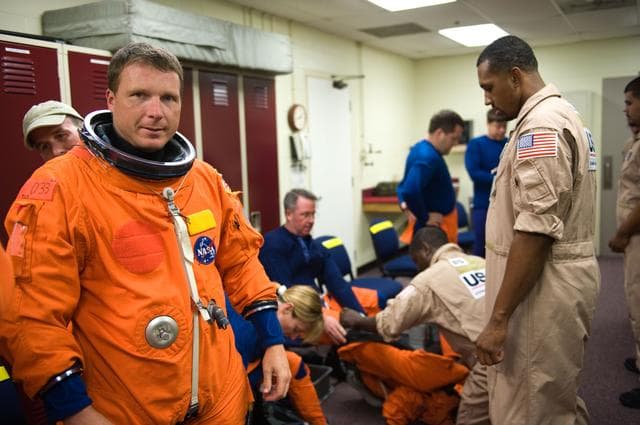 NASA image: STS-130 crew during payload egress training at Full Fuselage Trainer (FFT). 
