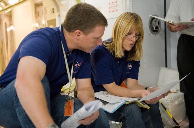 NASA image: STS-130 crew and Expedition 22 crew member T.J. Creamer during module outfitting training. 
