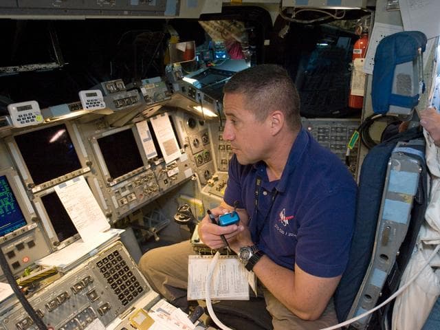 NASA image: STS-130 crew during their Rendezvous sim time line training in the fixed base simulator in building 5 
