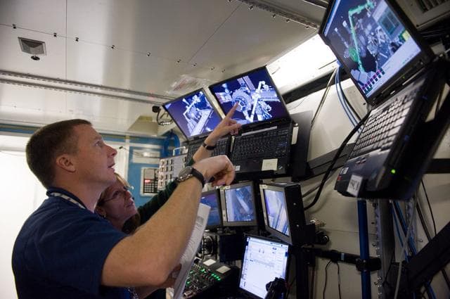 NASA image: STS-130 crew members Kay Hire and Terry Virts training in the ISS Lab 