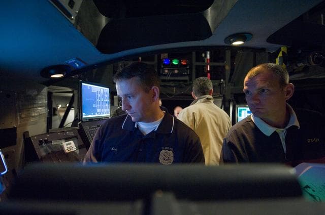 NASA image: STS-132 crew during their PDRS N-TSK MRM training in the building 16 cupola trainer. 