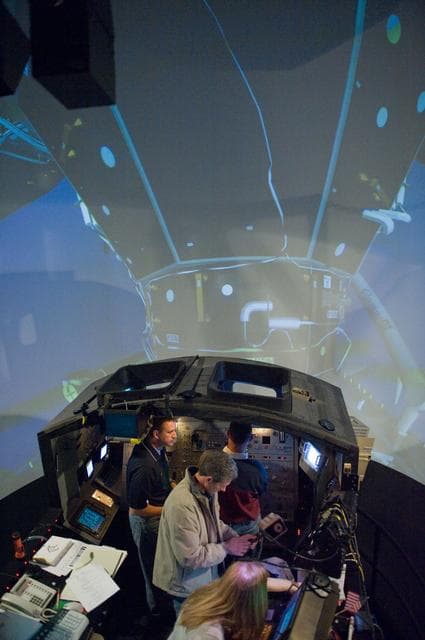 NASA image: STS-132 crew during their PDRS N-TSK MRM training in the building 16 cupola trainer. 