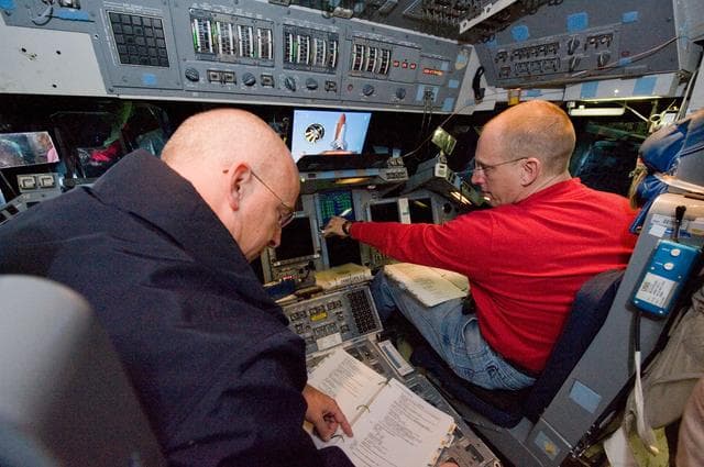 NASA image: STS-131 crew members during UNDOCK MAL Timeline training.