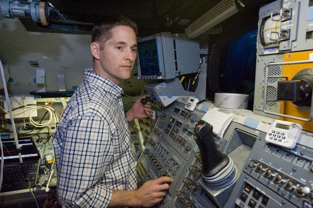 NASA image: STS-131 crew members during UNDOCK MAL Timeline training.