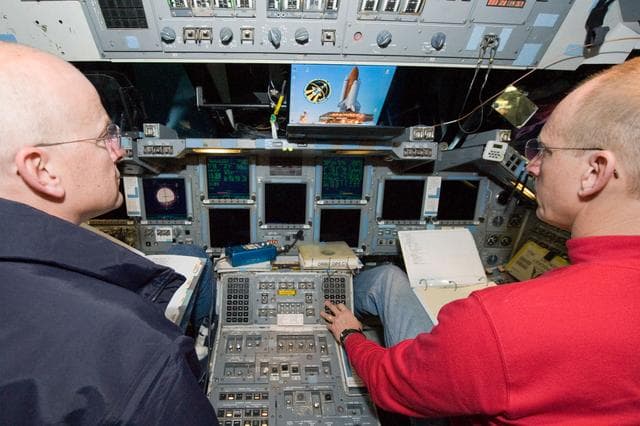 NASA image: STS-131 crew members during UNDOCK MAL Timeline training.