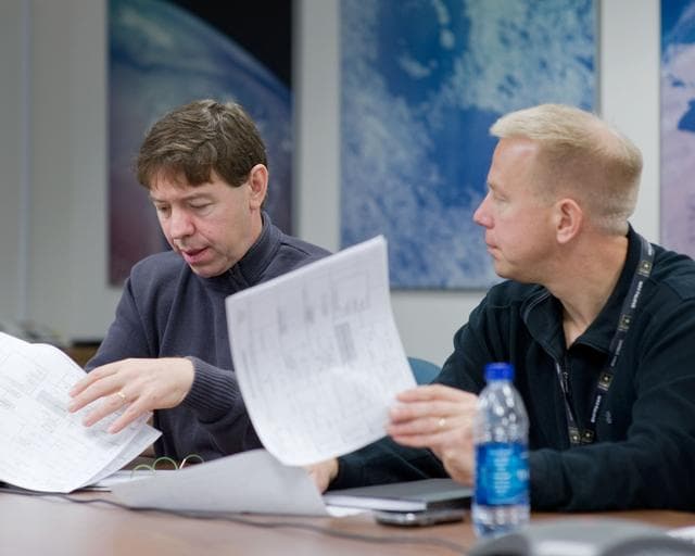 NASA image: STS-133 (Last Shuttle Mission) crew during their meeting with their scheduler Dale Williamson 