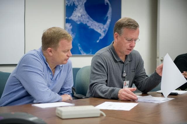 NASA image: STS-133 (Last Shuttle Mission) crew during their meeting with their scheduler Dale Williamson 