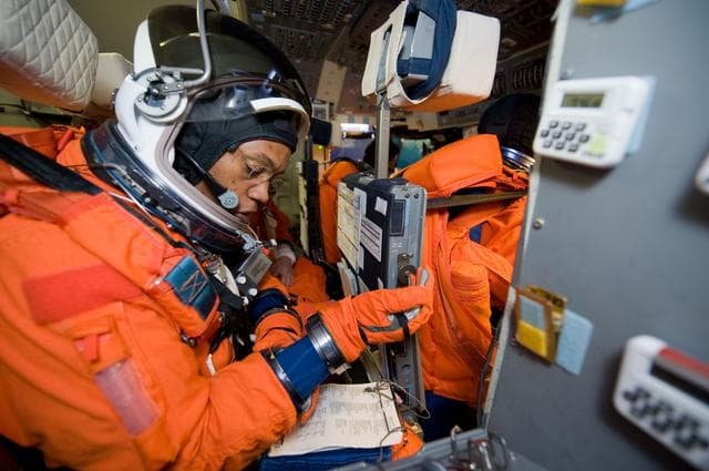 NASA image: STS-133 crew members Lindsey, Boe, Drew and Kopra for Motion Base Ascent Skill 32011 training 