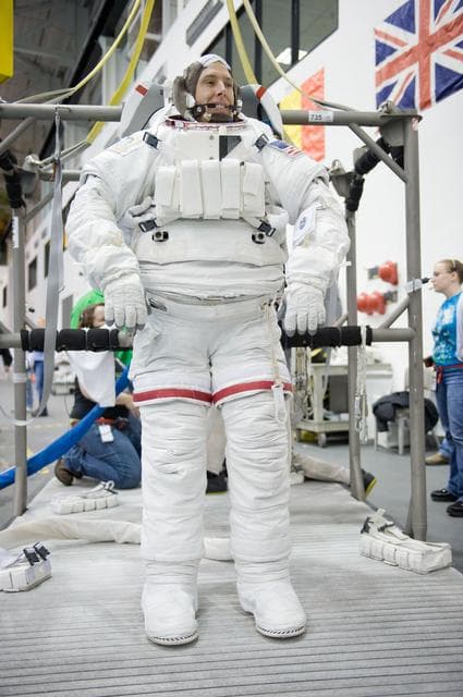 NASA image: STS-134 crew members Greg Chamitoff and Drew Feustel during their STS-134 ULF6 EVA1 training at the NBL. 